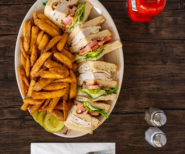 Turkey Club Sandwich and Fries