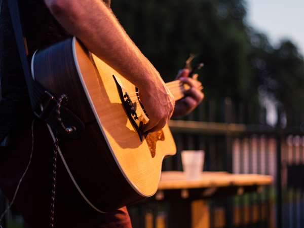 Person playing guitar